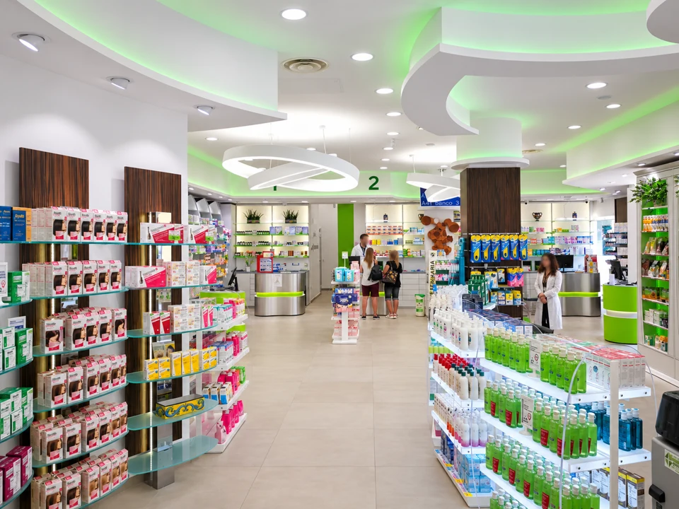 Spacious retail area with an organic green suspended ceiling