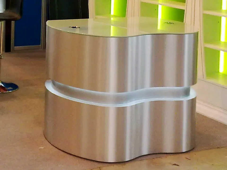 Cylindrical metal counter with green backlit insert