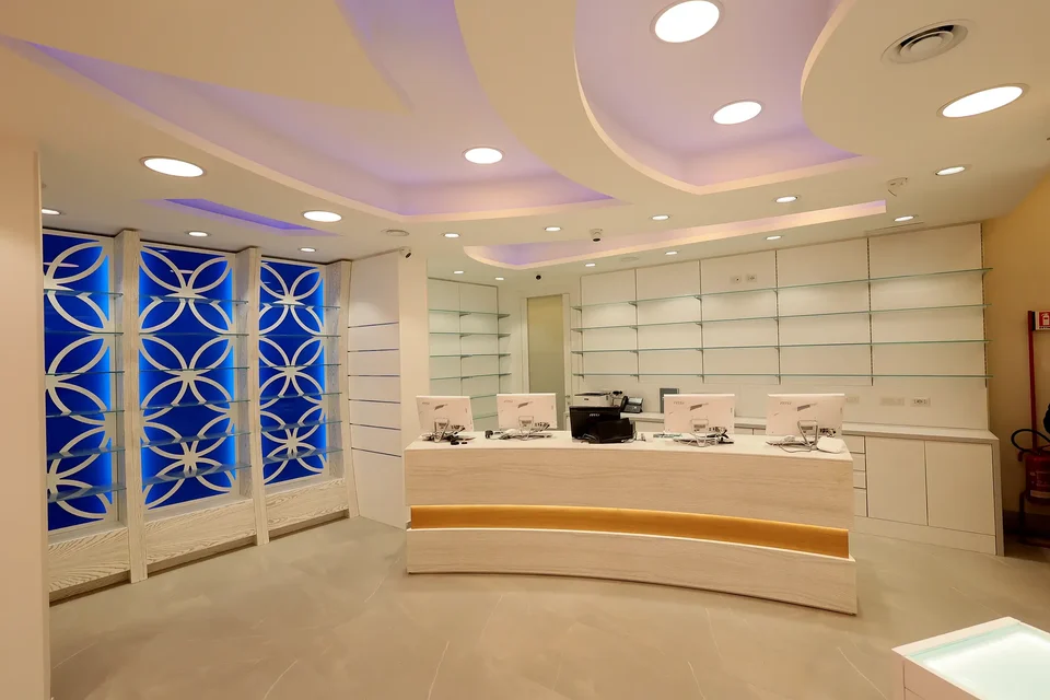 Linear counter with light-toned walls and blue decorative insert