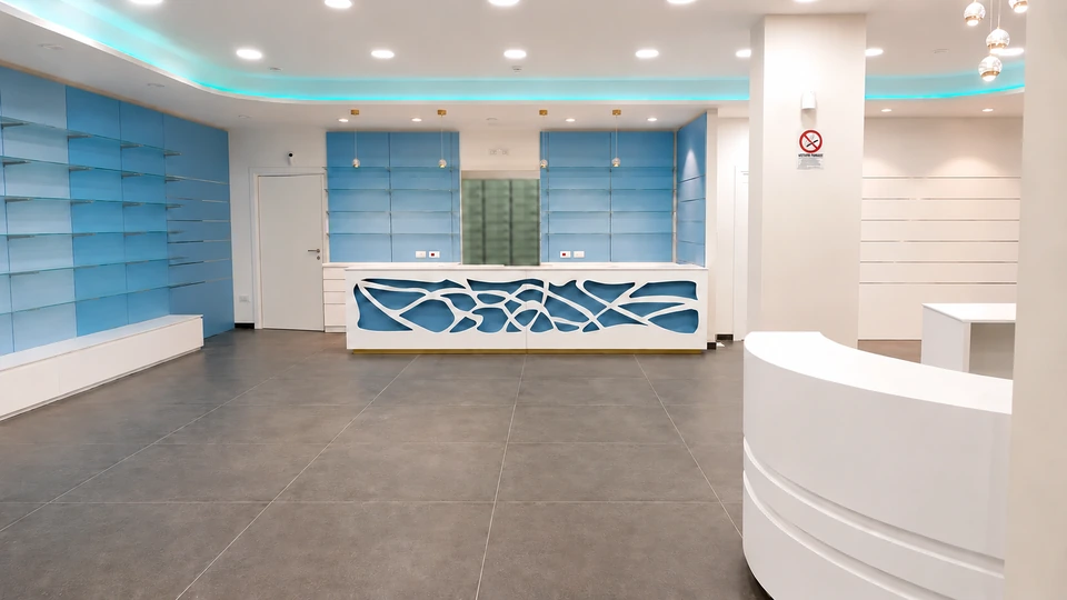 Shaped counter in front of pale-blue display walls