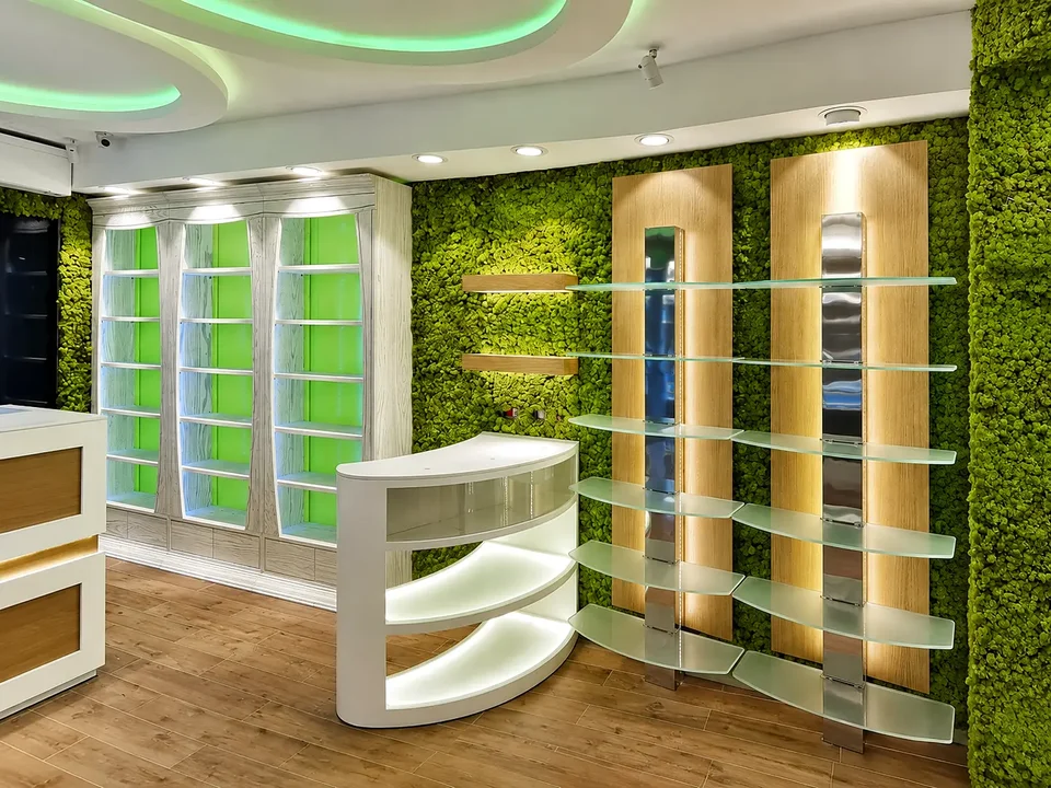 Vertical green wall with illuminated display arches