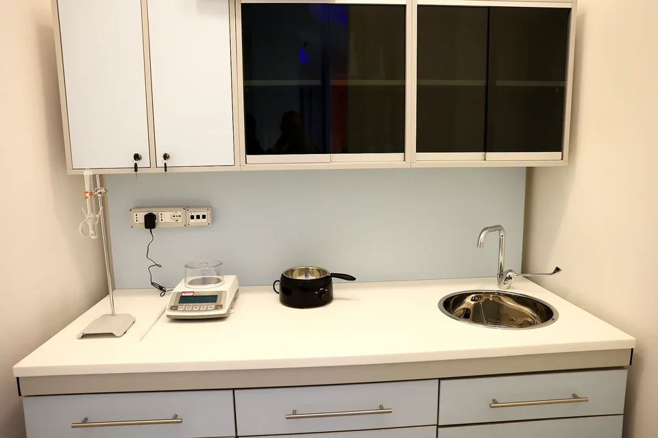 Technical worktop with sink and glazed wall units