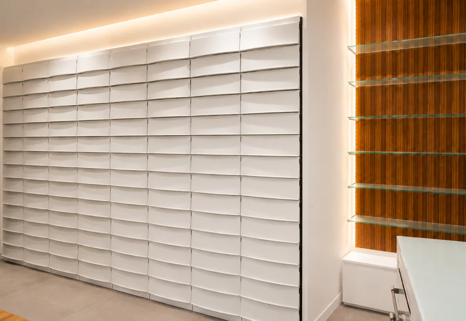 Curves and light: interwoven wood — Linear white shelving between wood walls