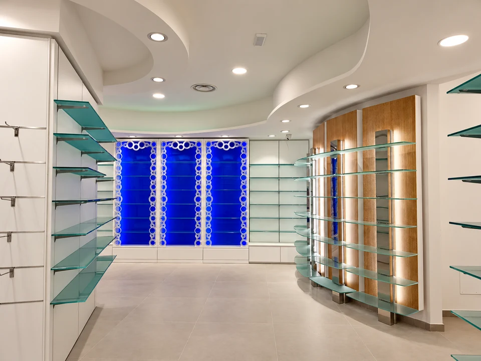 Interior view with central column and curved display systems